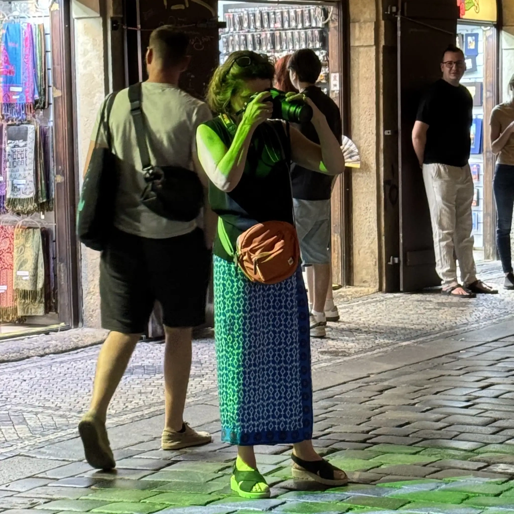 Julie taking photos in Prague to use in her artwork and aintimngs